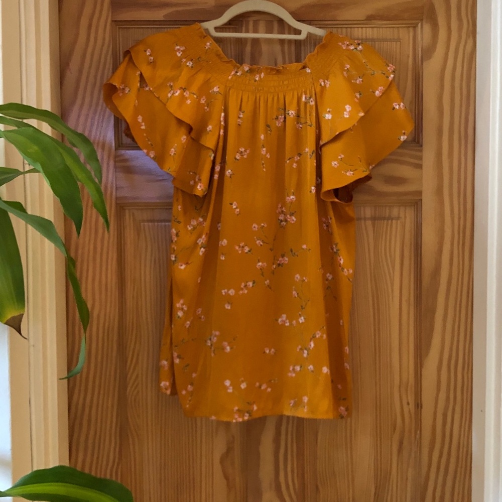 Express mustard yellow silk top with floral print